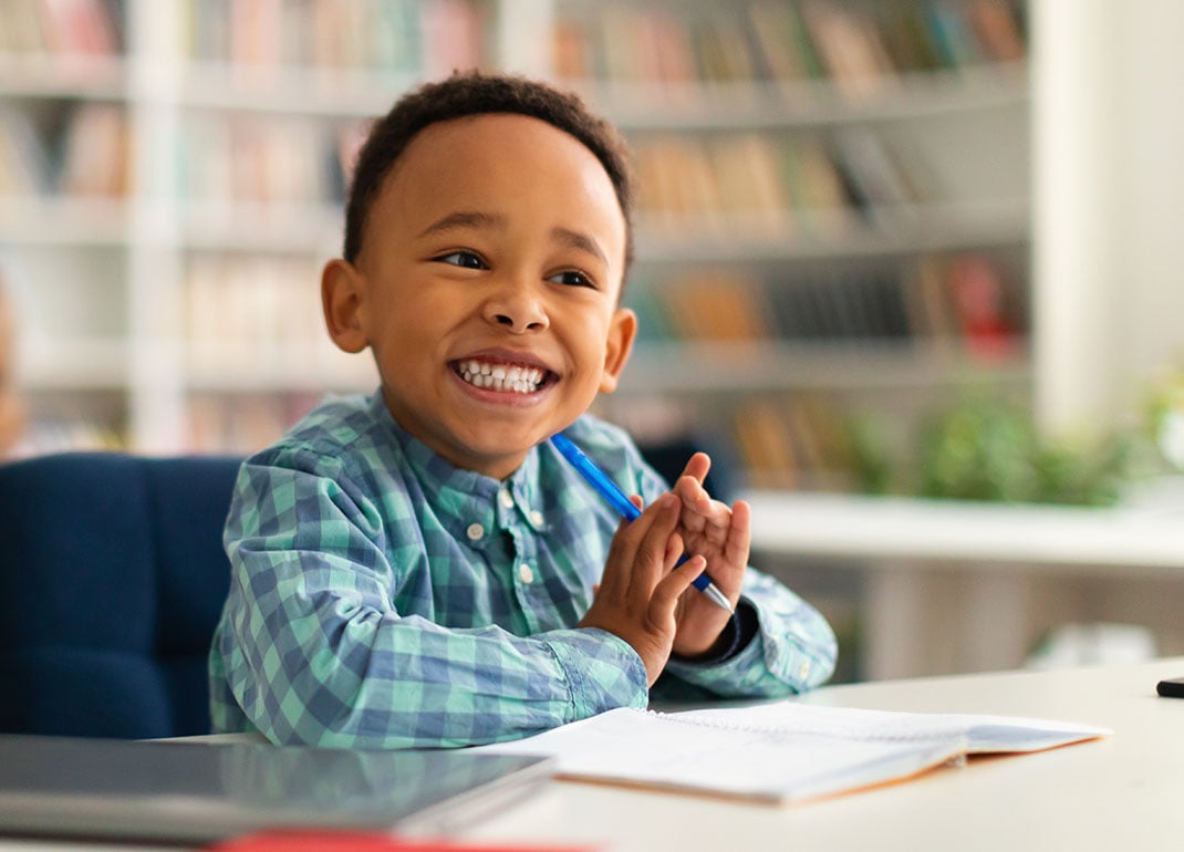 cheerful-boy-in-classroom