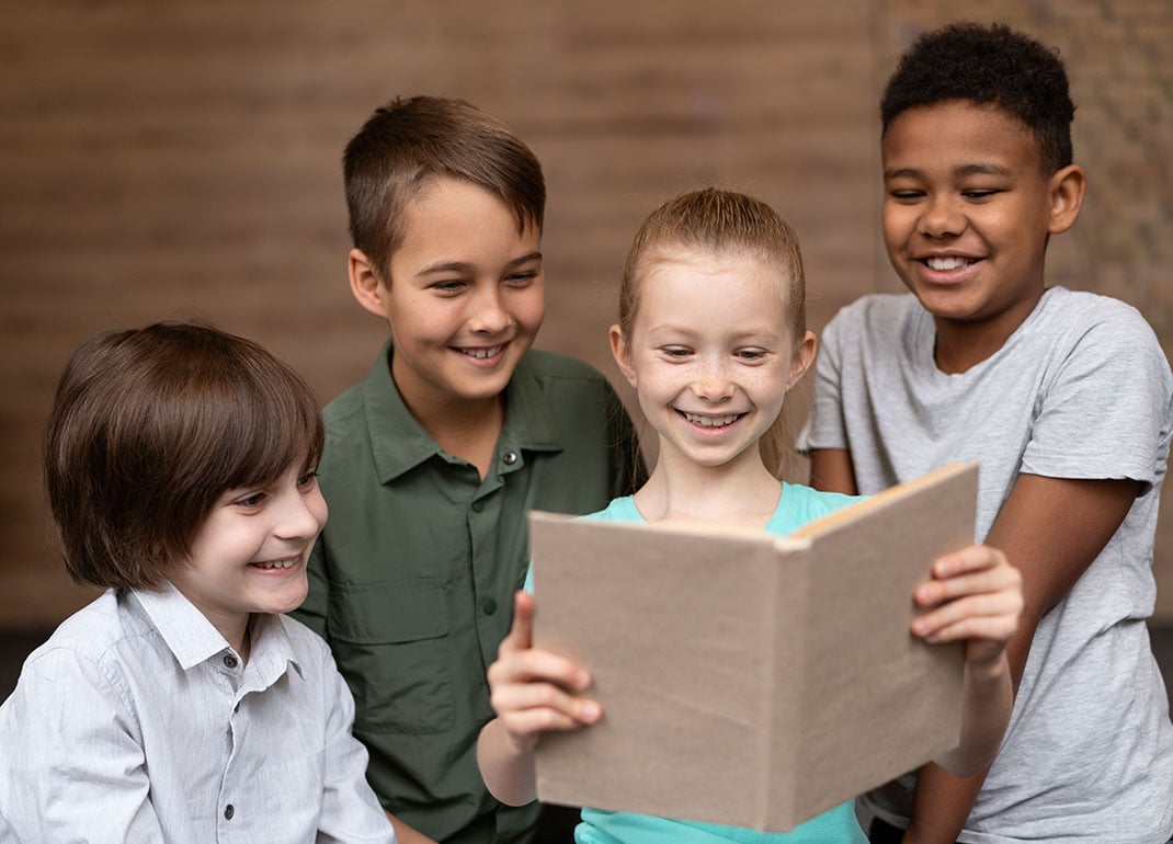 group-of-kids-reading-book